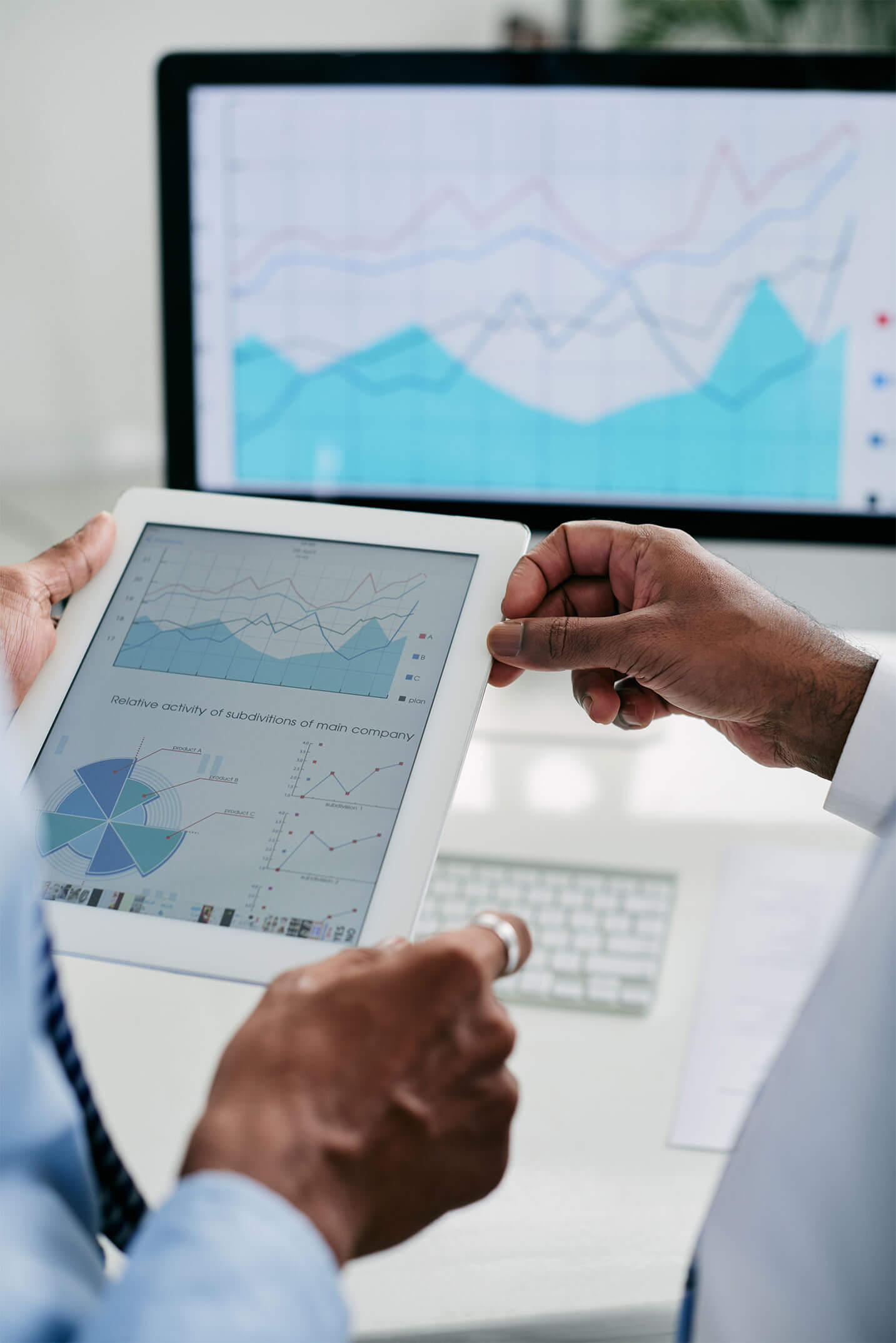 Enterpreneurs discussing financial charts